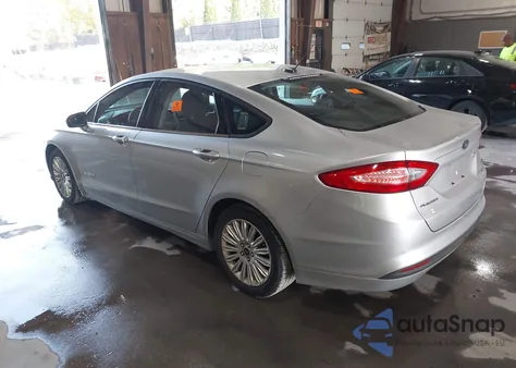 2013 Ford Fusion Hybrid Se z USA, uszkodzony, nr VIN 3FA6P0LUXDR115933